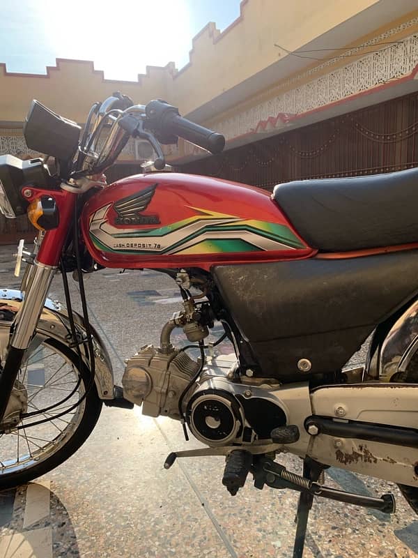 Honda cd 70 2023 with golden number 5