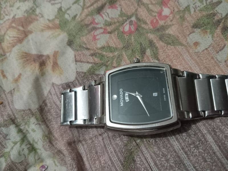 MOVADO swiss made black and steel body 0