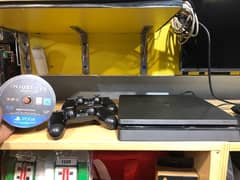 ps4 slim with 2 controllers and injustice game