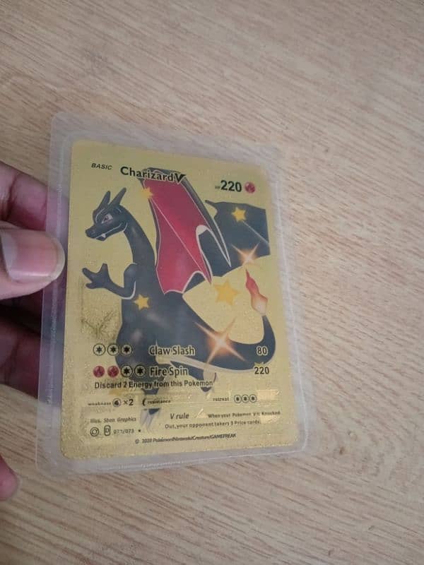 Pokémon Charizard V VMAX Gold foil card's. 2