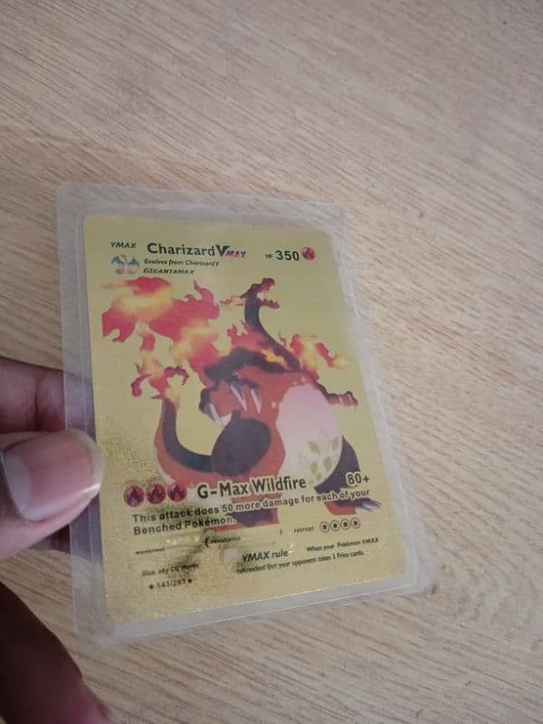 Pokémon Charizard V VMAX Gold foil card's. 3