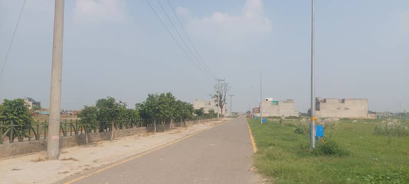 At main Road 1 Kannal Plot for sale in woods Block in Paragon City Lahore 12