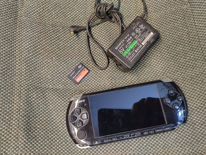 psp 3004 with 16gb memory card Sony 0