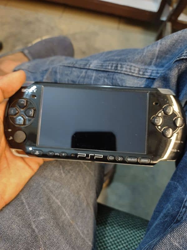 psp 3004 with 16gb memory card Sony 7