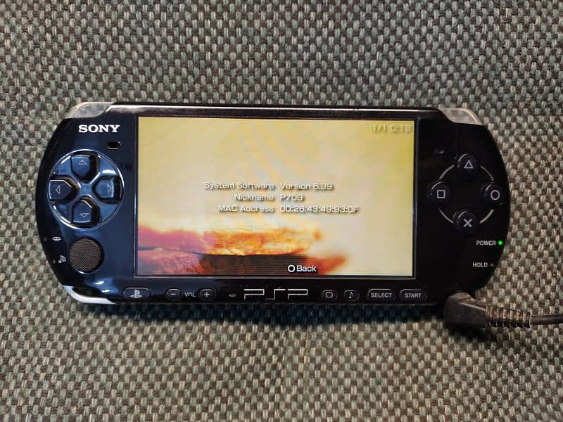 psp 3004 with 16gb memory card Sony 12