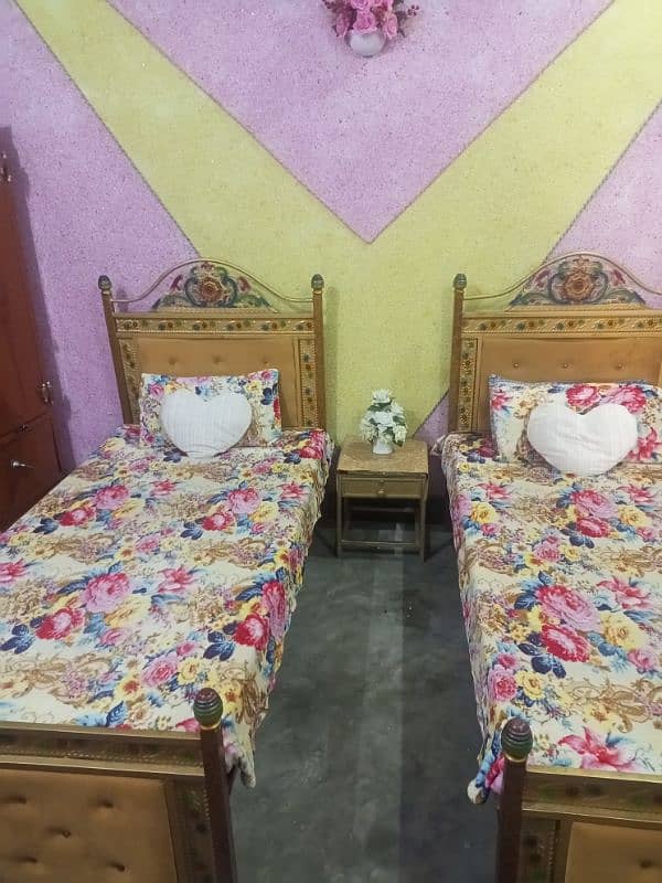 2 single iron beds 3