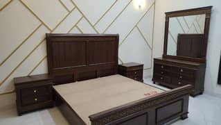 Brand New bed set with two side tables and one Dressing for sale.