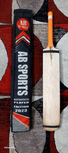 Coconut tape ball bat and its cover for sale