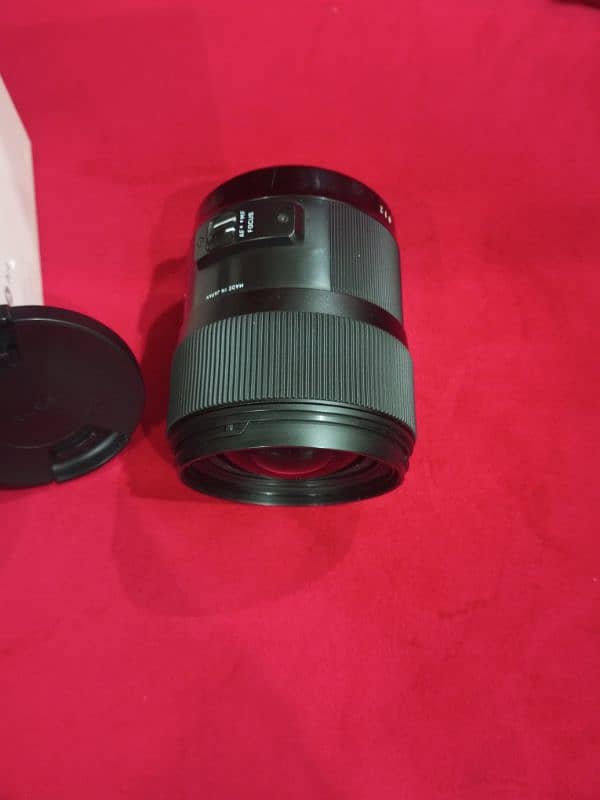 sigma lens 35mm F1.4 DG HSM Canon for sale slightly used. 4