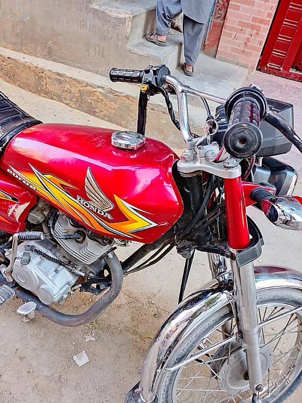 HONDA CG 125 2021 model KARACHI NUMBER contact num 0.3. 4.7. 6.2. 2.0. 1.9 4