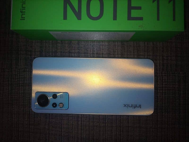 Infinix note 11 with [box and charging doc] 3