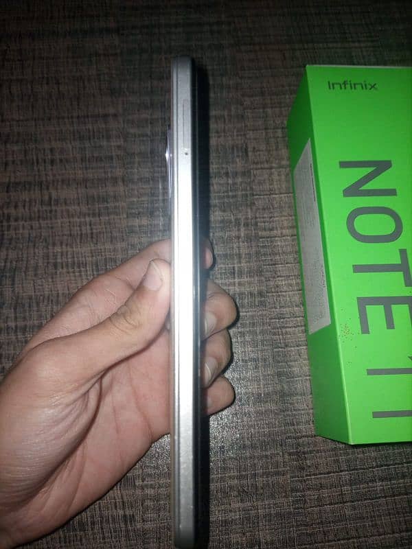 Infinix note 11 with [box and charging doc] 7