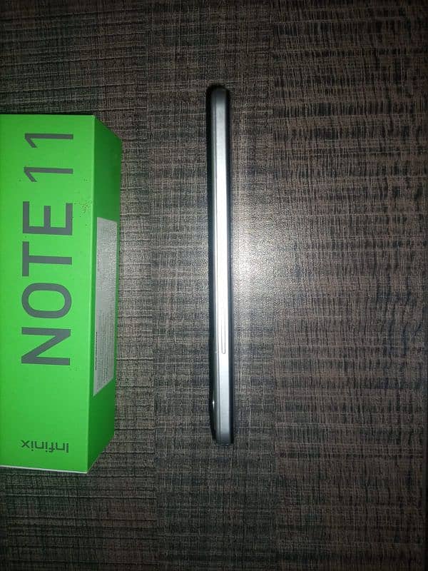 Infinix note 11 with [box and charging doc] 9