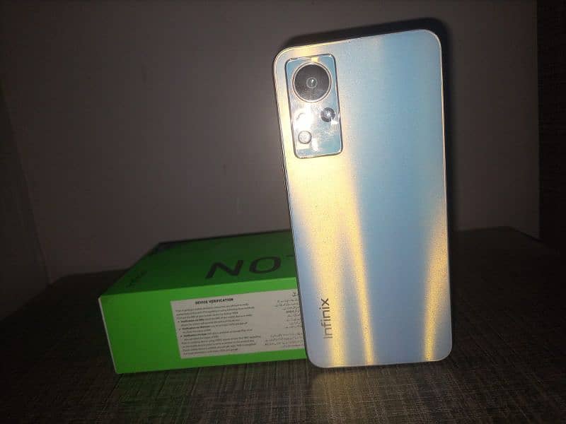 Infinix note 11 with [box and charging doc] 10