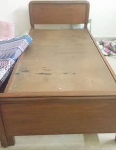 two single bed with single side table with drawer