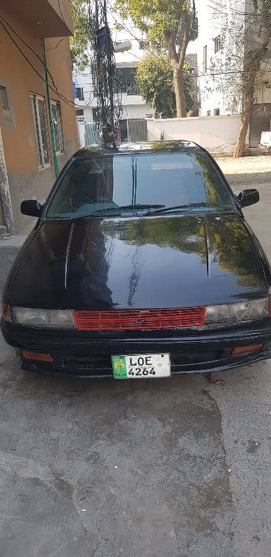 Mitsubishi Lancer 1990 axchaing bhi ho sakti hai 2