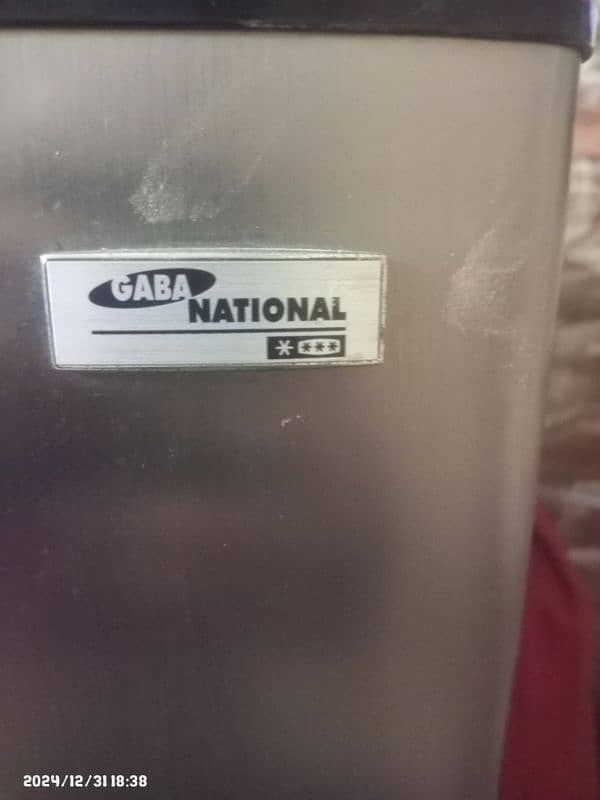 Gaba Nationa Refrigerator with a freezer and a fridge section, 34 inch 1