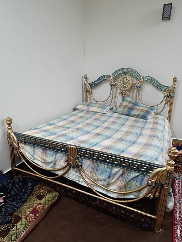 Iron rod double bed with spring matress 0