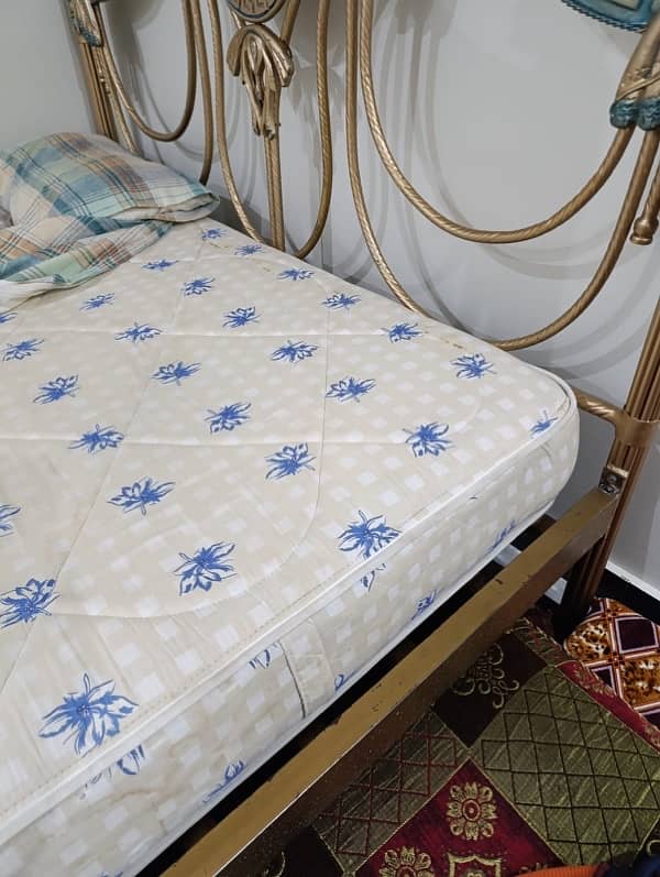 Iron rod double bed with spring matress 1