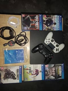 Ps4 slim with 2 original controllers and 5 games cd