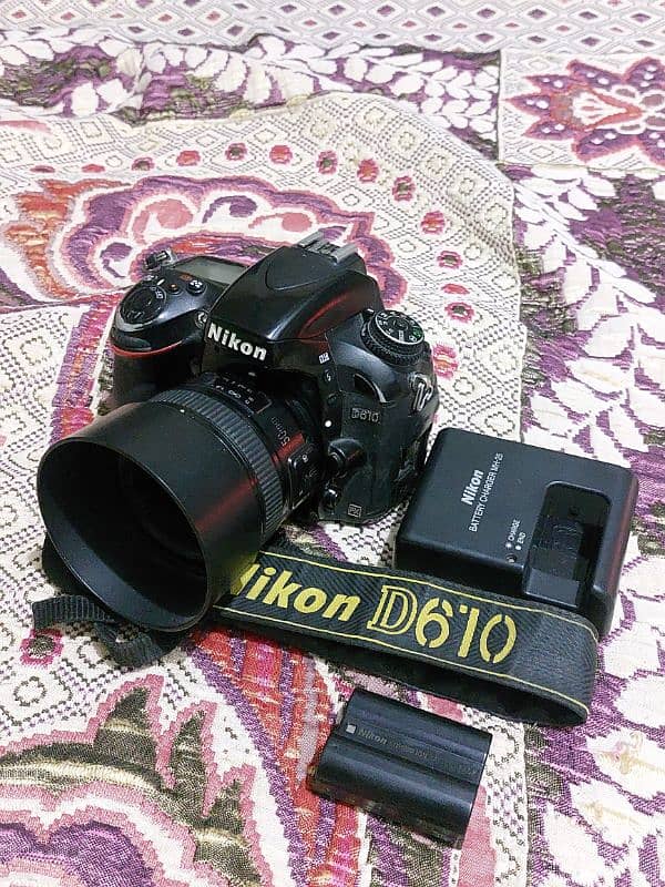 Nikon D610 body with youngnuo 50 mm lense 0