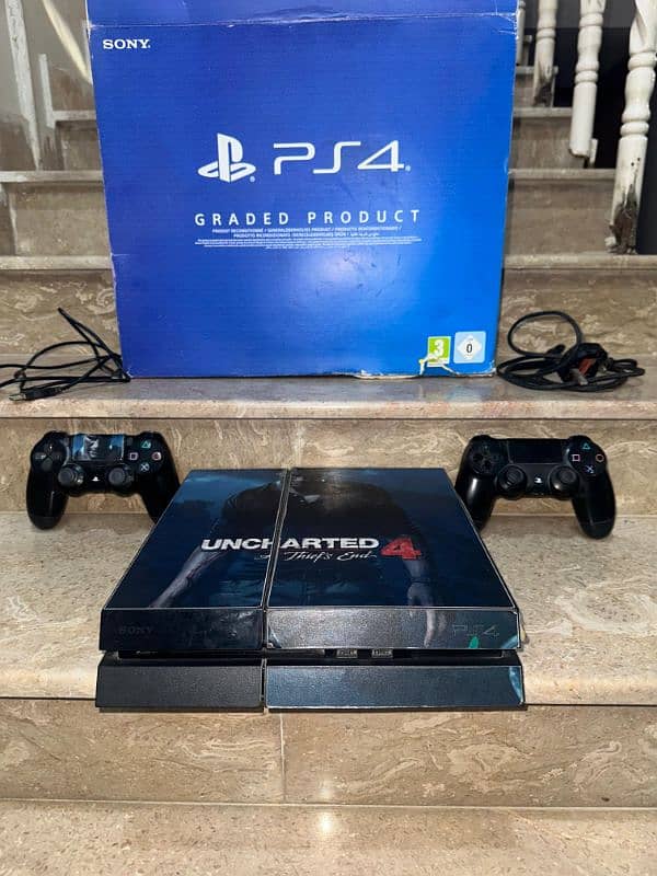 Playstation 4 with 2 controllers 3