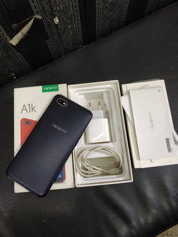 oppo A1k 2/32 with box charger duel sim official pta 0