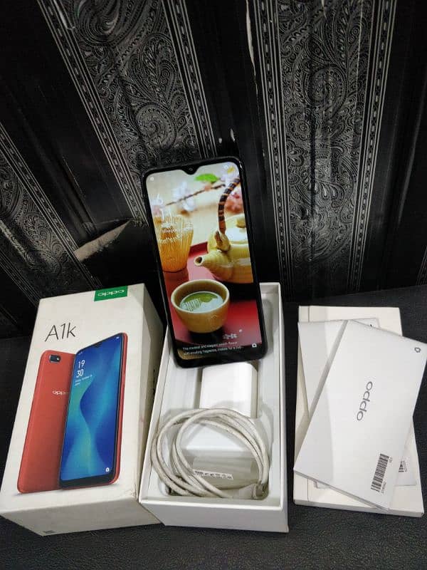 oppo A1k 2/32 with box charger duel sim official pta 1