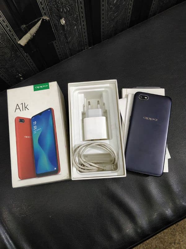 oppo A1k 2/32 with box charger duel sim official pta 3