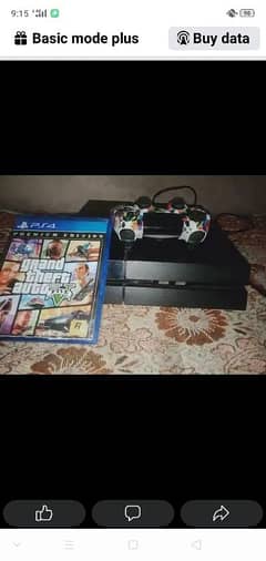 ps4 with controller and CD gta5