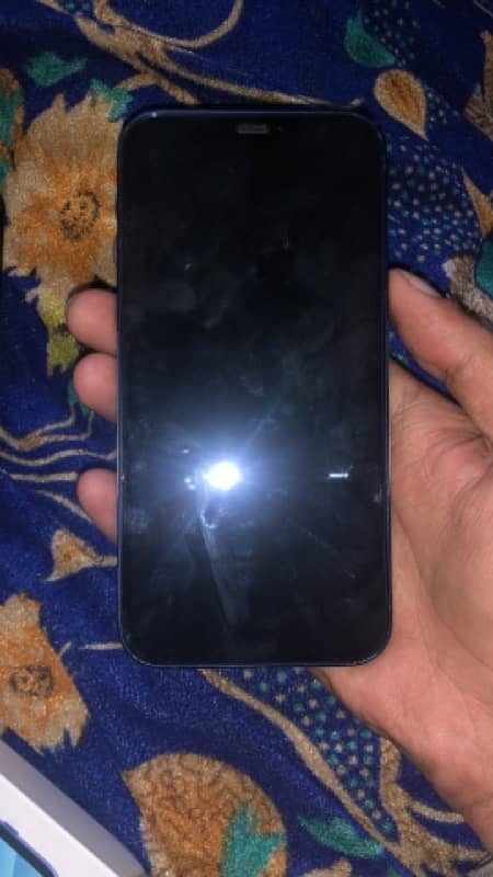 i phone 12 blue color 79 bettry health PTA approved  10/10 condition 0