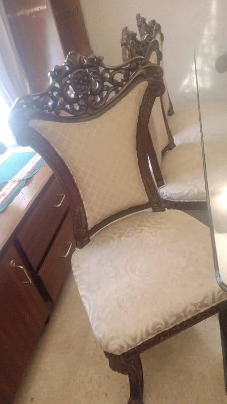 Shesham woodDining table with 8 chairs condition is very good 2