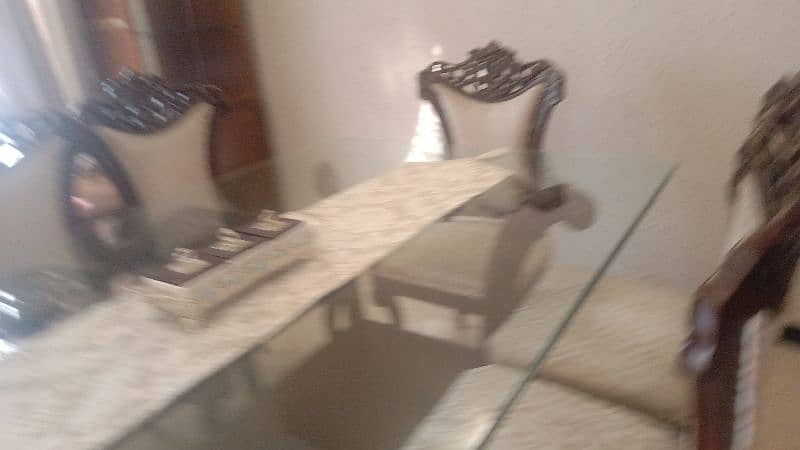 Shesham woodDining table with 8 chairs condition is very good 6