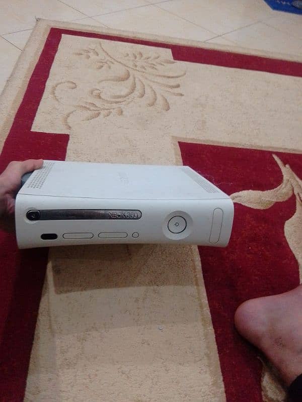 Xbox 360 with two controllers 1