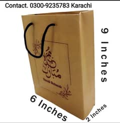 Kraft Paper bags with handles and printed Umrah Mubarak