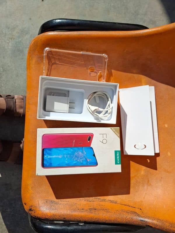 Oppo f9 4 64 total geniun phone with full box super fast charger 3