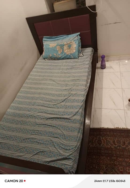 Two single wooden beds without mattress. Almost new 2