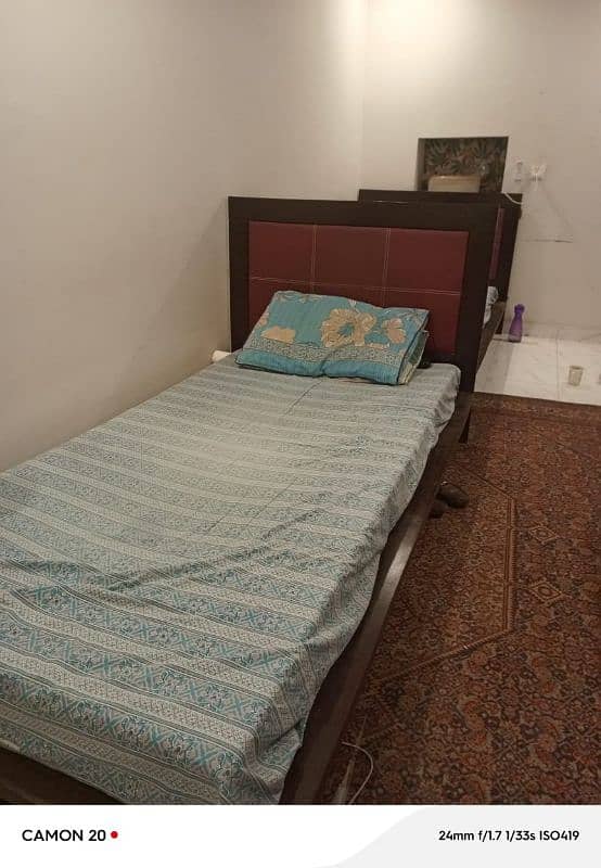 Two single wooden beds without mattress. Almost new 3