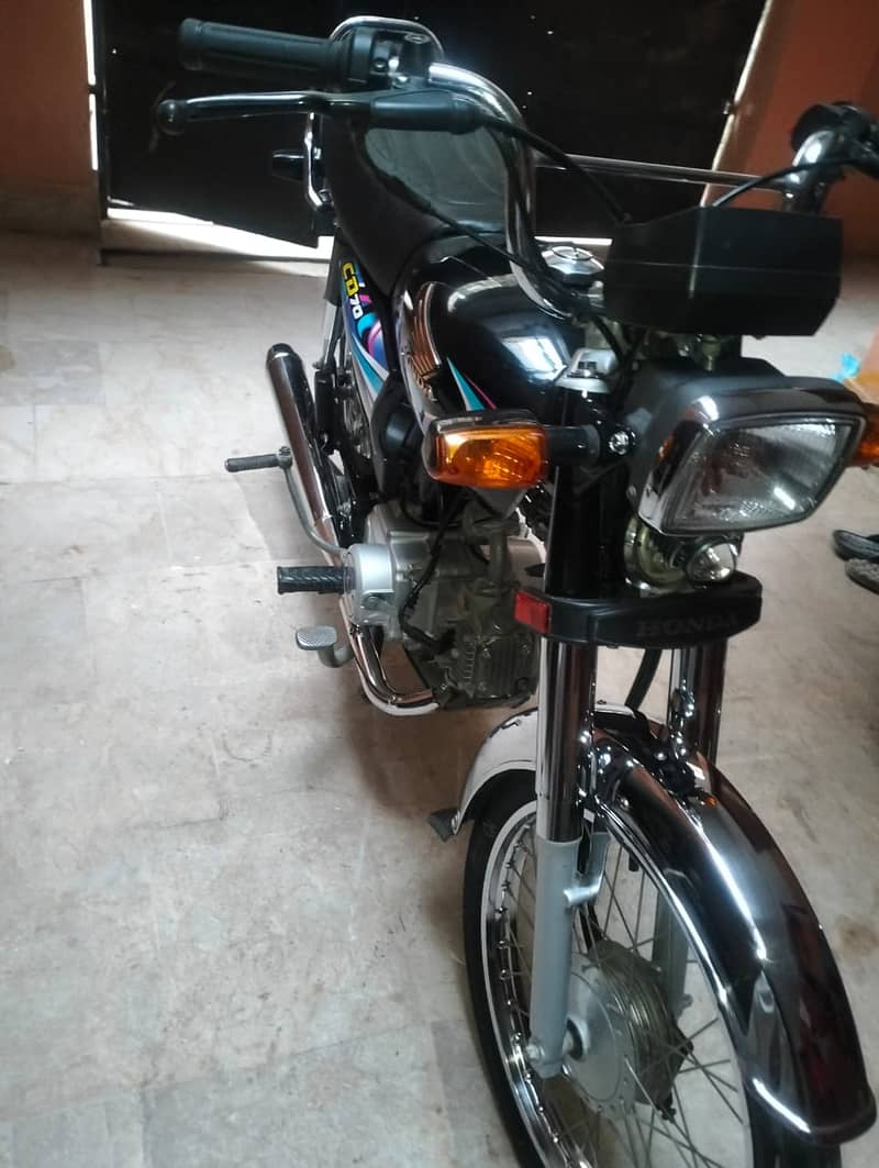 Honda CD 70 2024 4