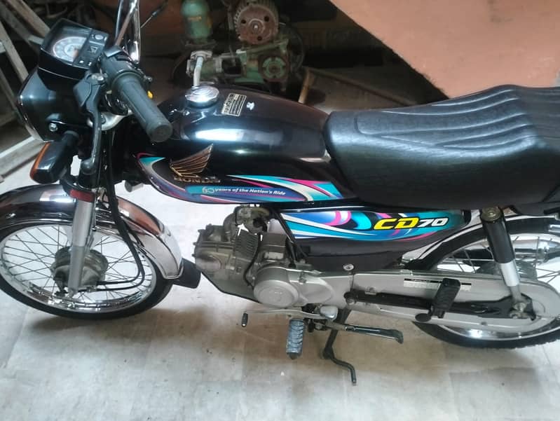 Honda CD 70 2024 8