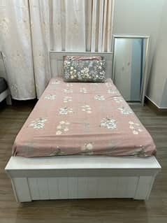 Beautiful White Single Bed with Floral Bedsheet