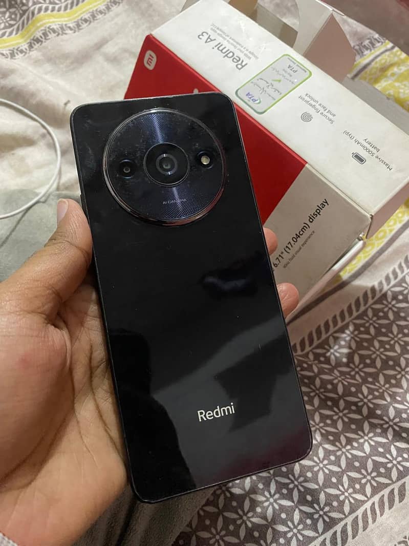 Redmi a3 4/128 with box charger 2