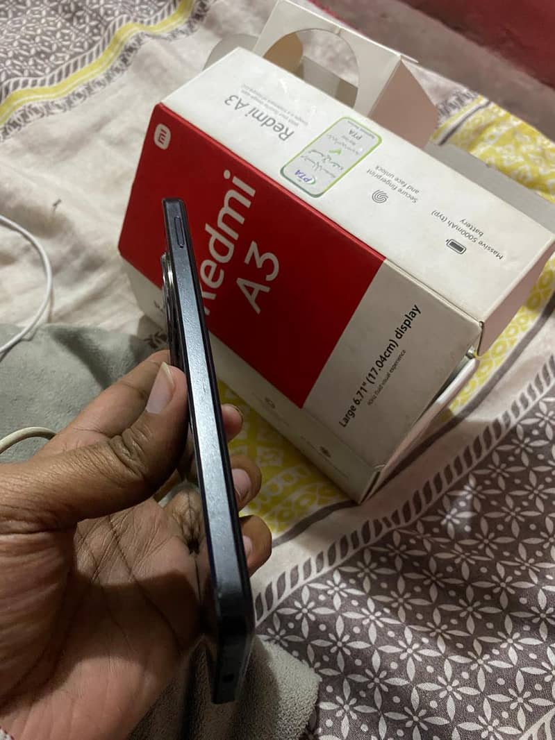 Redmi a3 4/128 with box charger 4