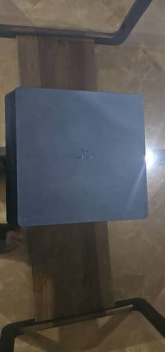 PS4 Slim 500GB with 2 controllers.