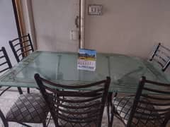 dining glass table and 5 iron chairs