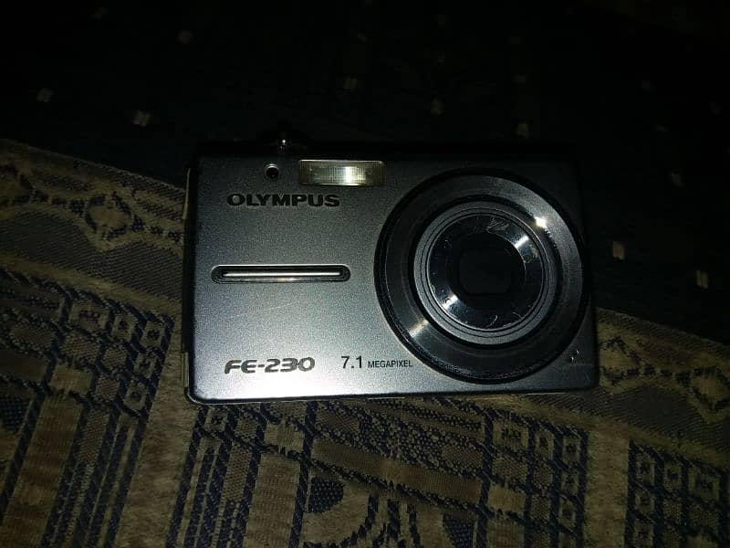 Olympus digital camera FE-230 battrey and focus problm for sel 2