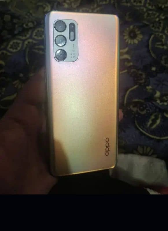 oppoReno 6  I am selling  rem 8 memory 128 2