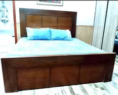 kind size wooden bed