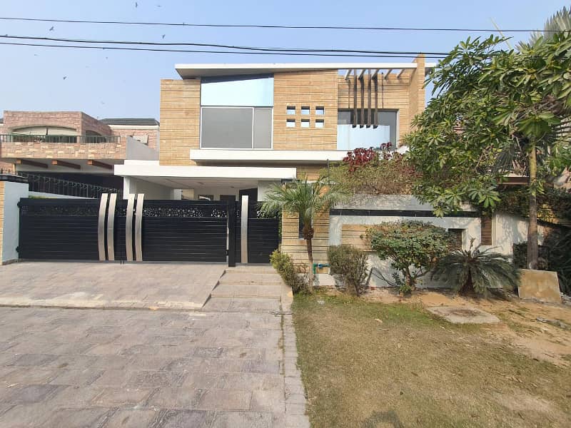 Well Maintained One Kanal Designer Bungalow Available For Rent Near Main Road Hot Location 0