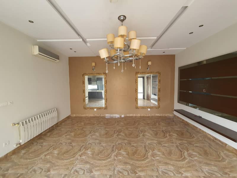 Well Maintained One Kanal Designer Bungalow Available For Rent Near Main Road Hot Location 15